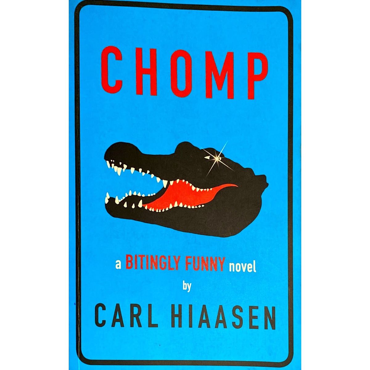 ISBN: 9781444006452 / 1444006452 - Chomp: A Bitingly Funny Novel by Carl Hiaasen [2013]